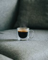 Close-up of coffee cup on table