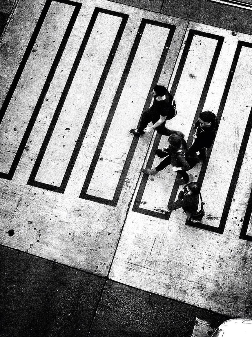 high angle view, street, sidewalk, day, metal, safety, outdoors, sunlight, shadow, wall - building feature, flooring, paving stone, security, protection, elevated view, tiled floor, no people, full frame, directly above