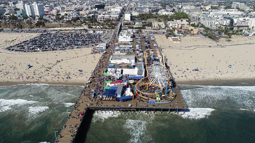 High angle view of crowd by sea