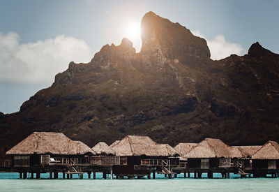 Huts in bora bora with mountain view