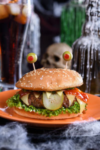 The monster burger will definitely lift your spirits and is the perfect snack for a halloween party.