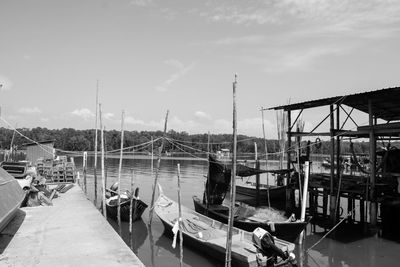 Boats moored in calm sea