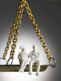 Close-up of chain against black background