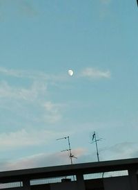 Low angle view of moon against sky