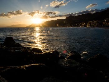 Scenic view of sea against sky during sunset