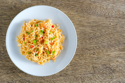 High angle view of vegetables in plate on table