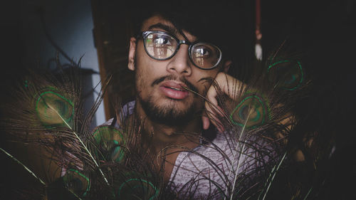 Portrait of young man wearing eyeglasses