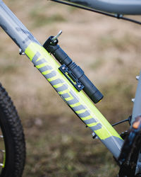 Close-up of bicycle on field