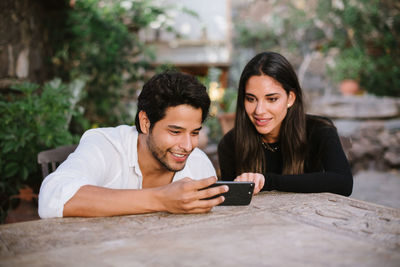 Young man using mobile phone