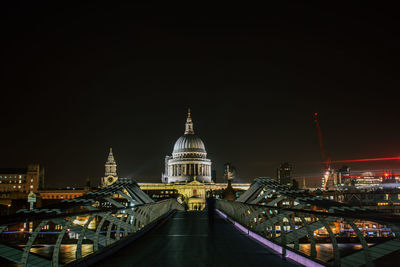 Illuminated cathedral against sky at night