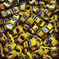 Heap of yellow taxi cabs