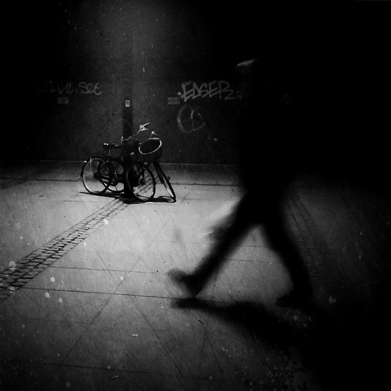 bicycle, shadow, transportation, street, silhouette, land vehicle, men, sunlight, mode of transport, night, walking, high angle view, unrecognizable person, road, cycling, riding, lifestyles, focus on shadow