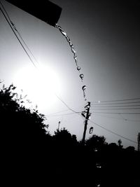 Low angle view of power lines