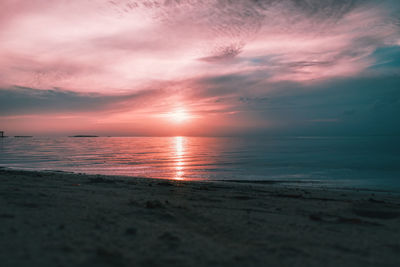 Scenic view of sea against sky during sunset