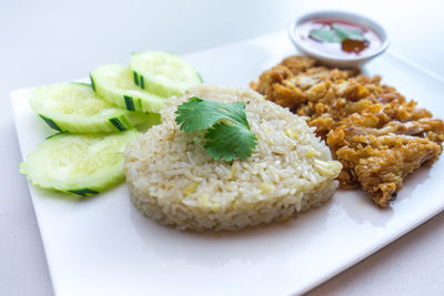 Close-up of served food in plate