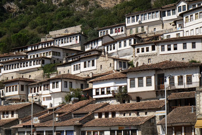 Traditional ottoman houses in old town berat known as the white city of albania