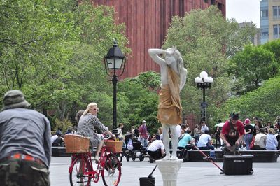 People relaxing on tree