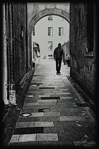 Narrow alley in front of building