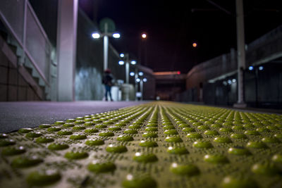 Close-up of yellow line at train station