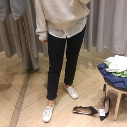 Low section of men standing on floor