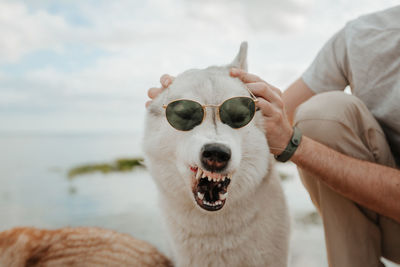 People with dog outdoors