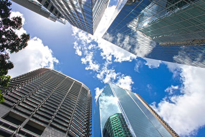 Low angle view of skyscrapers against sky