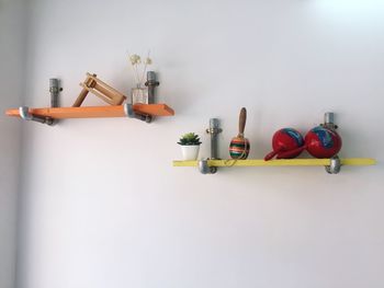View of toys on shelf at wall