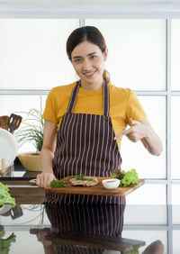 Portrait of a smiling young woman