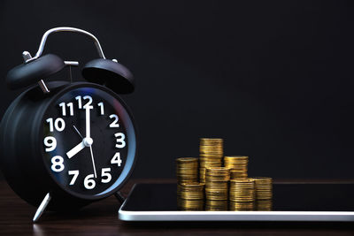 Close-up of clock on table