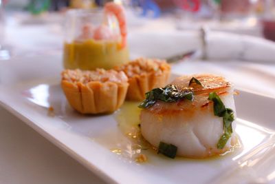 Close-up of food served on table