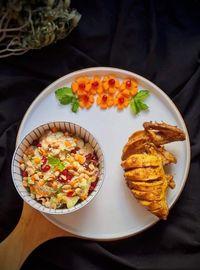 High angle view of meal served on table