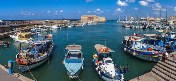 High angle view of boats moored at harbor