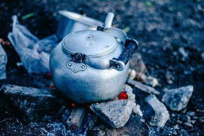 Close-up of teapot on fire