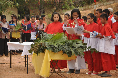 People during palm sunday mass