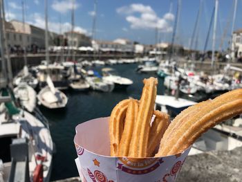 Close-up of food in container at harbor