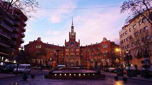 View of city street at dusk