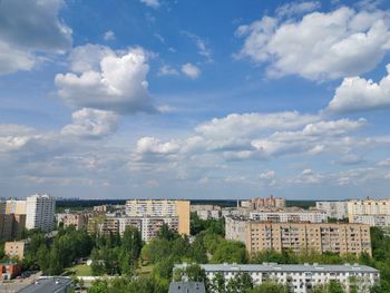 Buildings in city against sky