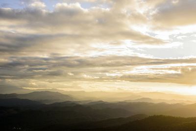 Scenic view of mountains against sky during sunset