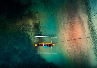 High angle view of boat moored on sea