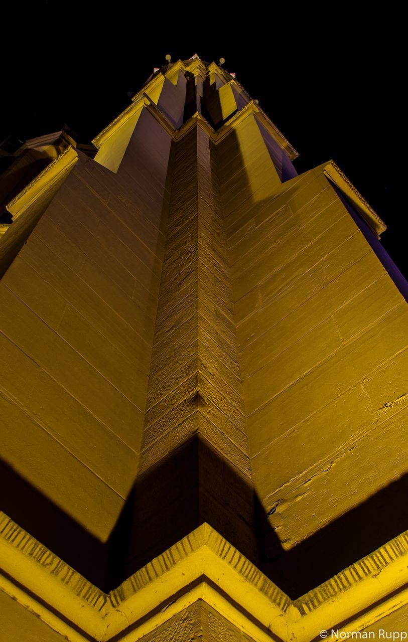 low angle view, illuminated, architecture, night, built structure, building exterior, pattern, lighting equipment, design, religion, architectural feature, no people, decoration, spirituality, yellow, place of worship, outdoors, ceiling, clear sky, famous place