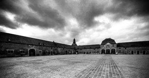 View of historical building against cloudy sky