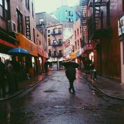 Woman walking on city street