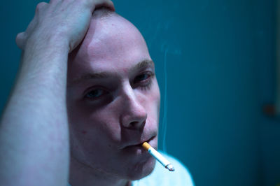 Close-up of a man smoking