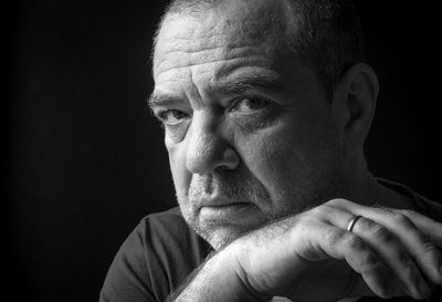 Sad adult male close-up. black and white portrait