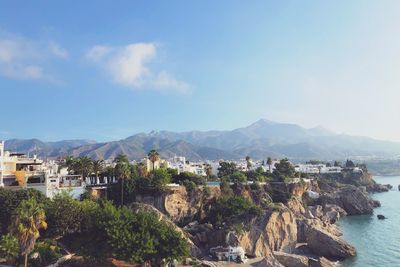 View of townscape by sea