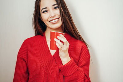 Portrait of a smiling young woman