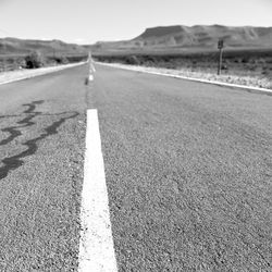 Surface level of road against the sky