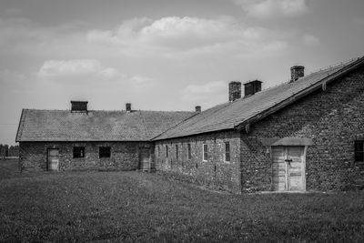 House on field against sky