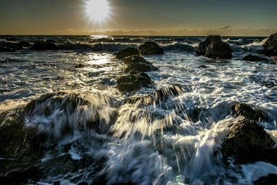 Waves splashing on rocks