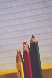 Close-up of colored pencils on table